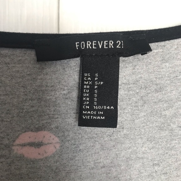 Kisses black dress, upper thigh/mid thigh length. Tie front. - Picture 3 of 3